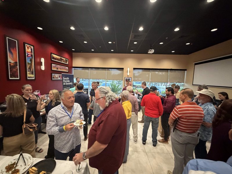 Guests sharing ideas at the South Florida AI Society meetup.